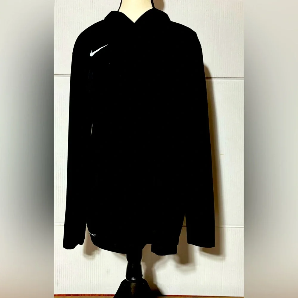 Nike women’s medium light weight long sleeve hoodie. Athletic cut Dri-Fit. 29” L